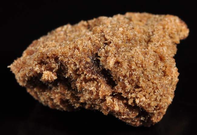 brown orange-ish chunk of bubble hash
