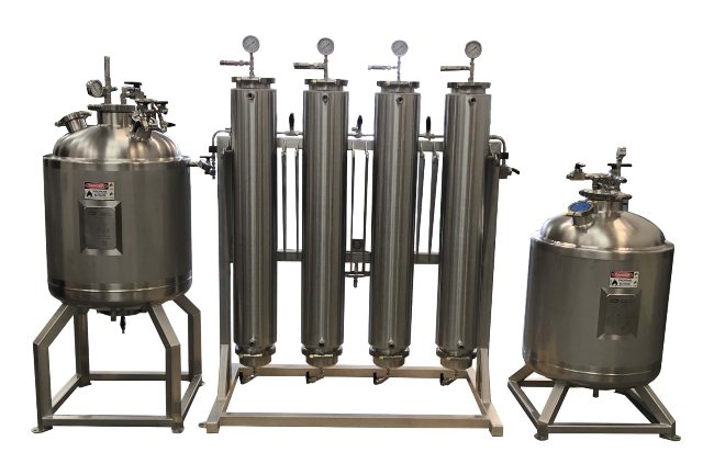 A silver metal machine with different compartments and chambers that are all connected